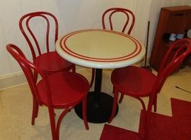 Enamel top table with iron base and 4 bentwood chairs from a soda shoppe excellent condition