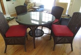 brown wicker table and chairs
