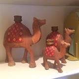Hand carved and painted wood camel candlesticks