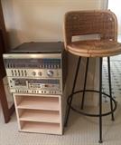 Stereo, speakers, bar stool