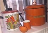 Orange enamelware pot. Made in Poland. 