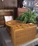 1920's bedroom suite: nightstand, chest of drawers, headboard and frame, mattresses included. Wicker suitcase, baskets, flower pots, ferns