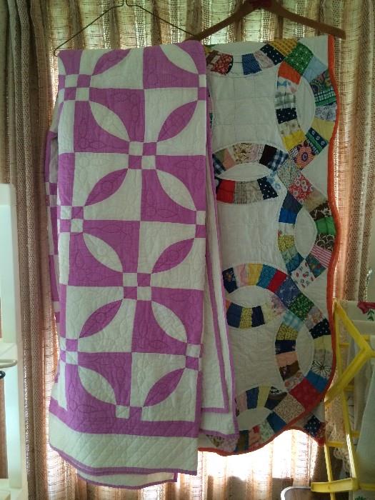 WONDERFUL HAND MADE QUILTS, ONE ON RIGHT (DOUBLE WEDDING RING),