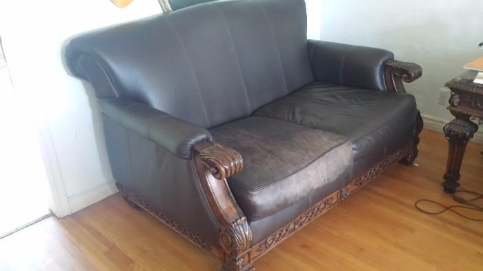 Love seat with crave wood. Has couch to match. 