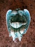 angel hangs on the wall