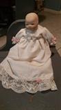 Lovely little doll baby with bisque head, hands and feet.