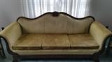 Empire sofa upholstered in gold velvet