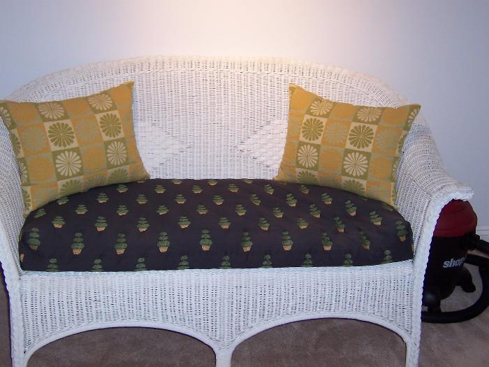 Cute white wicker loveseat with seat cushion.  So adorable anywhere!