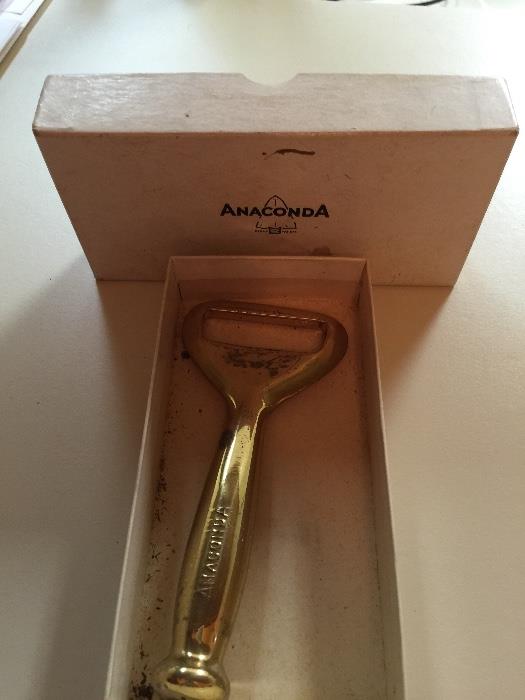 Vintage brass Anaconda bottle opener