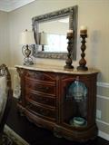 Buffet server, gilt wall mirror and decor pieces.