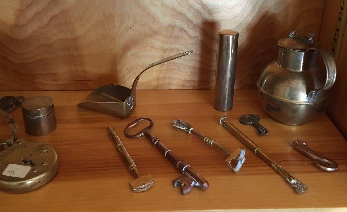 Neat old brass items -- antique locks, weights, keys, measures, milk jugs.