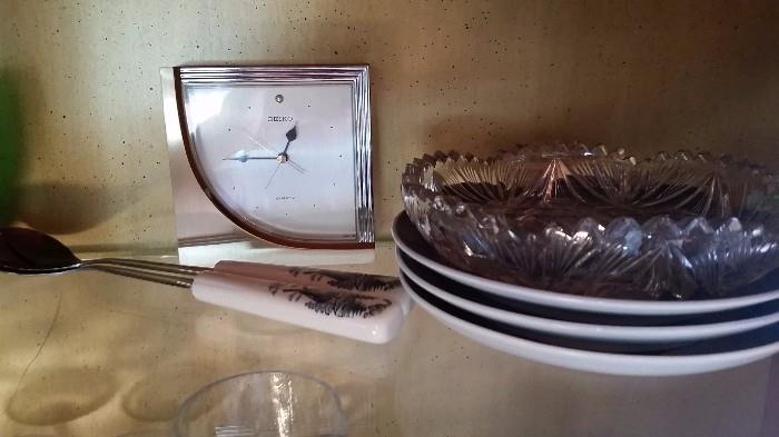 seiko clock, ceramic serving tongs, crystal, and royal copenhagen plates
