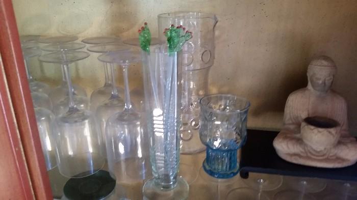 water glasses, glass stirs, and buddah