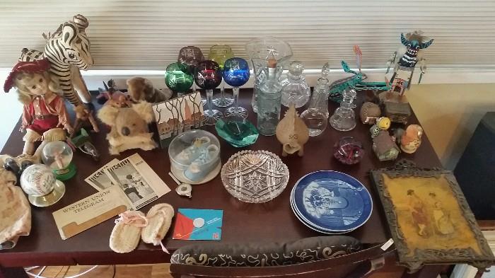 old toys and prints, polish wine glasses, crystal, kachina doll, antique mirror