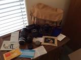 Vintage Canon AE1 35 mm camera with lenses
