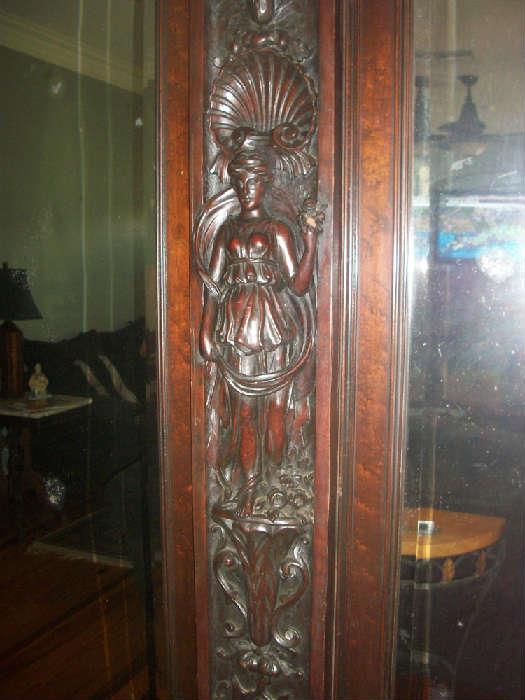 carvings on armoire