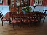 Beautiful banded mahogany table, by White Furniture Co., w/8 matching chairs, 2 arms & 6 sides.