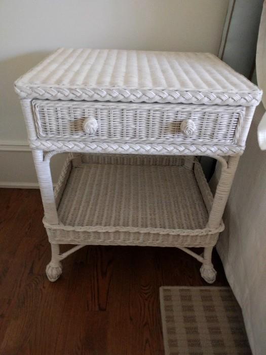 There's a pair of these wicker bedside tables