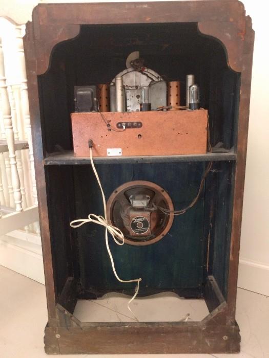 Yuck, radio intestines!                                                      Radio collectors value old tube radios by the number of tubes - this one has 6! 