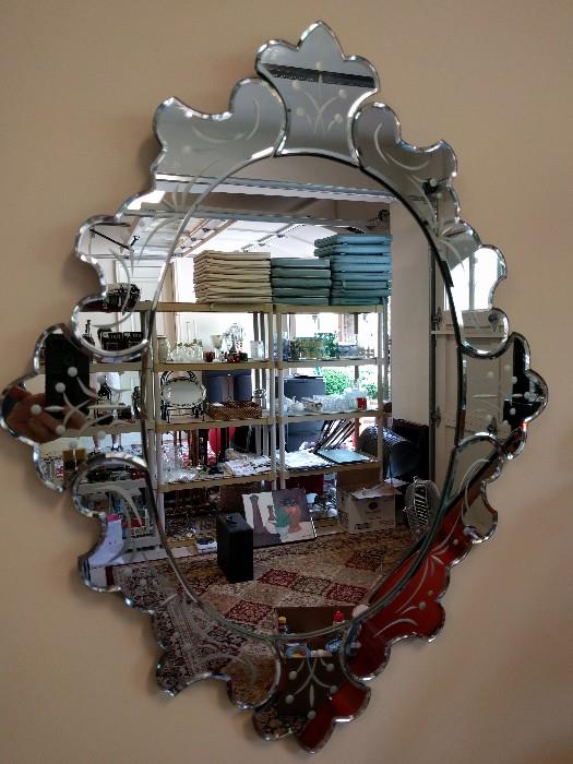 Italian Venetian mirror - if you hold your ear up to it, you can hear dirty water sloshing through the canals.