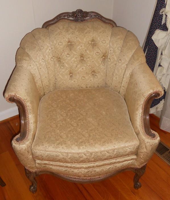 French Provincial cream colored upholstered chair with tufted back