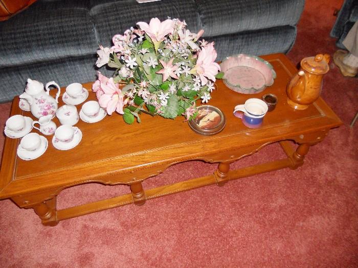 Oak coffee table with Bavarian tea set to the left