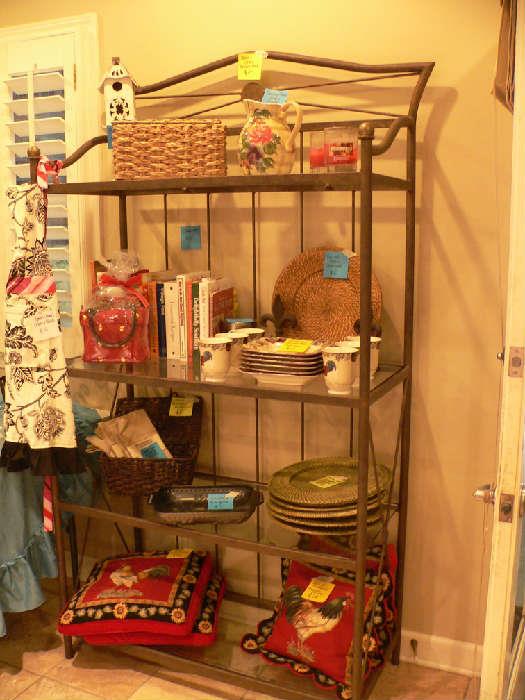 Iron and glass bakers rack with lots of great kitchen items