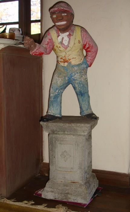 Vintage concrete jocky garden statue