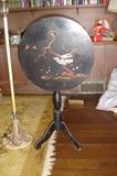 Antique black lacquer tea table with inlaid mother of pearl bird