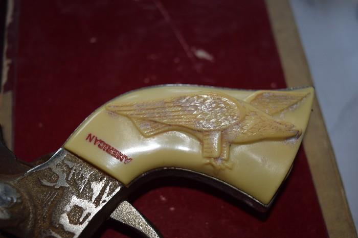 detail on handle of vintage toy cap gun