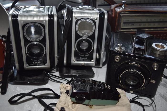 Vintage cameras including two Kodak Duaflex cameras and Brownie Flash 6-20