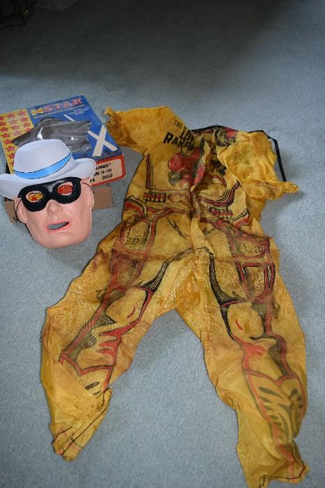 Vintage Child's Halloween Costume; Lone Ranger. The fabric part of the costume has significant staining and wear.