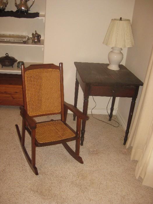 antique child's rocking chair and primitive table