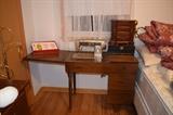 Sewing machine with cabinet and jewelry boxes