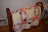 Hand made quilt and quilt rack