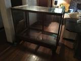 Display Cabinet, wood & glass, needs some work on right bottom side and sliding glass doors, very old