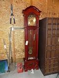 Daniel Dakota grandfather clock with cherry finish.