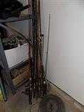 Many vintage fishing poles.