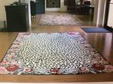 Animal pattern area rug with floral Border, from Bloomingdales