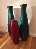 Large vases are clay. Smaller, red is Pier 1. 