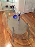 Double tiered glass table, chrome inspired legs. Excellent condition. 