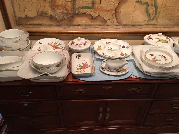 Some of the many serving pieces in the Royal Worcester Evesham pattern. Map in background not for sale.