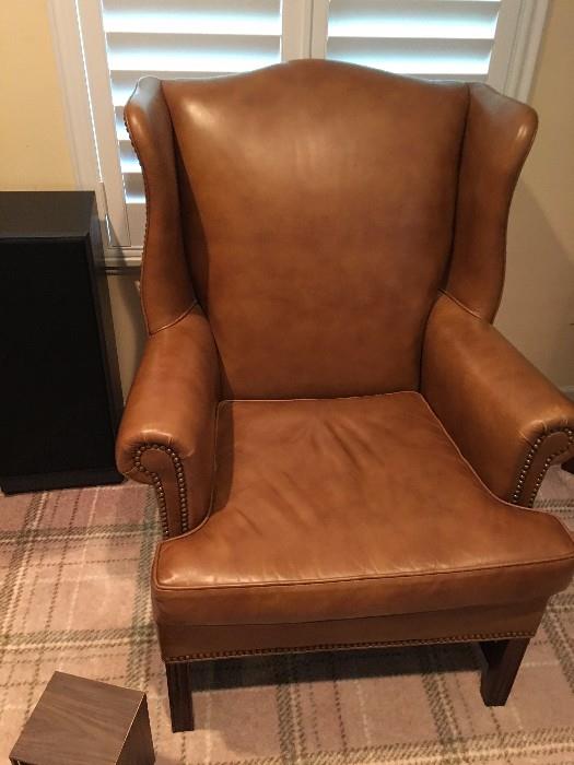 One of 2 Hancock & Moore leather chairs from Richard Honquest.