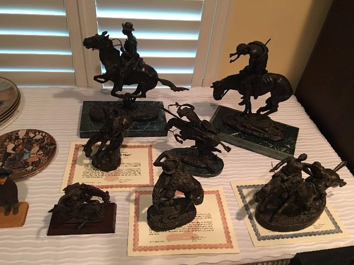 Nice assortment of Frederic Remington bronzes, prints, plates, and book.