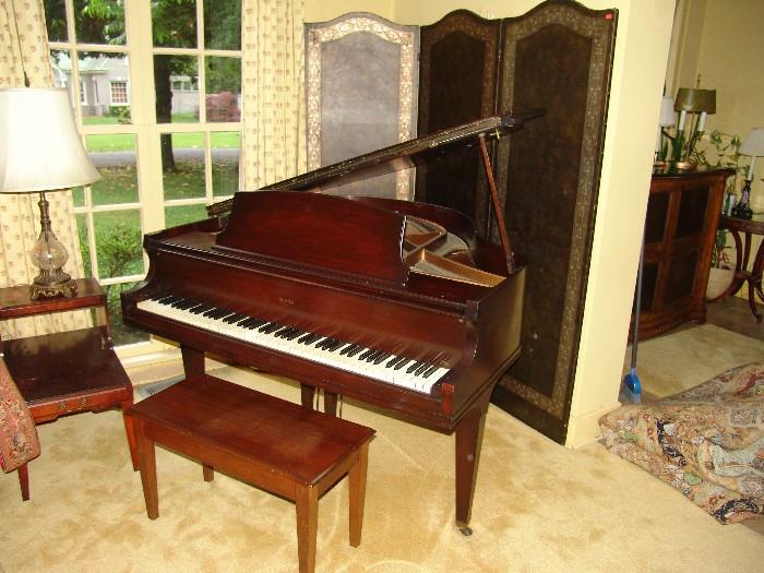 Mahogany baby grand piano