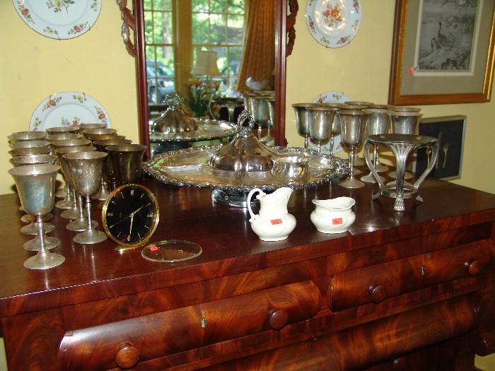 Two sets of silver plate goblets