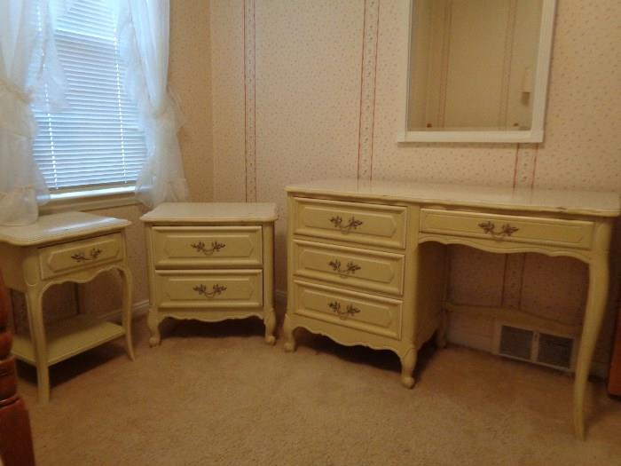 Desk/dressing table and two nightstands.