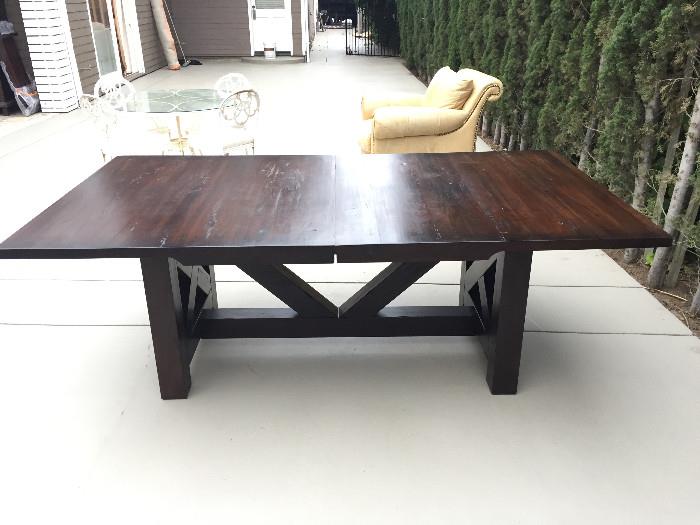 Solid wood trestle dining table (extra leaf not shown here)