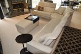 Stunning Ekornes Stressless 3 pc Paloma leather from the Comfort Collection.  There are two ellipse tables and a double ottoman with an espresso ottoman table from Bright Ideas