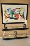 Dramatic foyer/sofa table and fun oversized artwork.